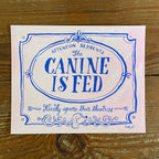 Illustration of a decorative Victorian-style sign on a pale pink background, blue hand lettering reads Attention Residents: The Canine is Fed, Kindly Ignore Their Theatrics